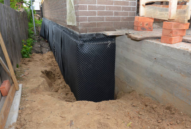 Happy homeowners after waterproofing job in Stevenson